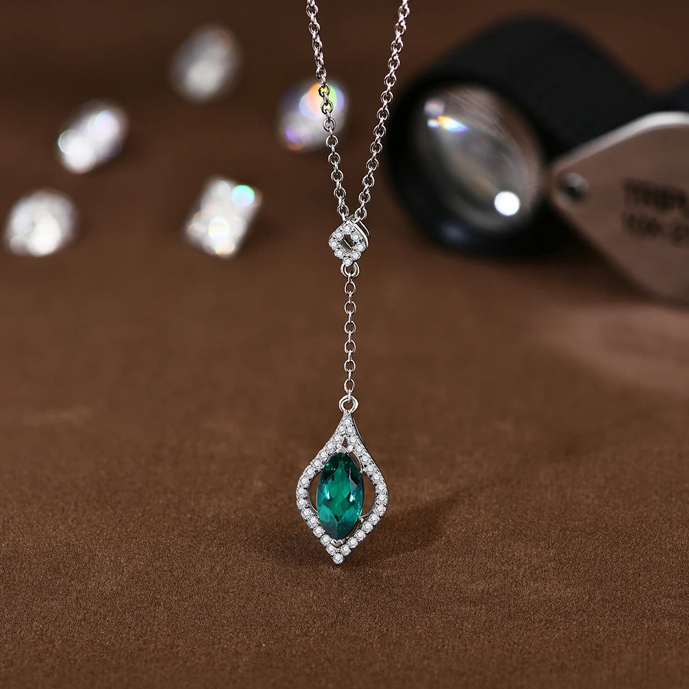 Marquise-Cut Emerald and Moissanite Pendant Necklace in Sterling Silver