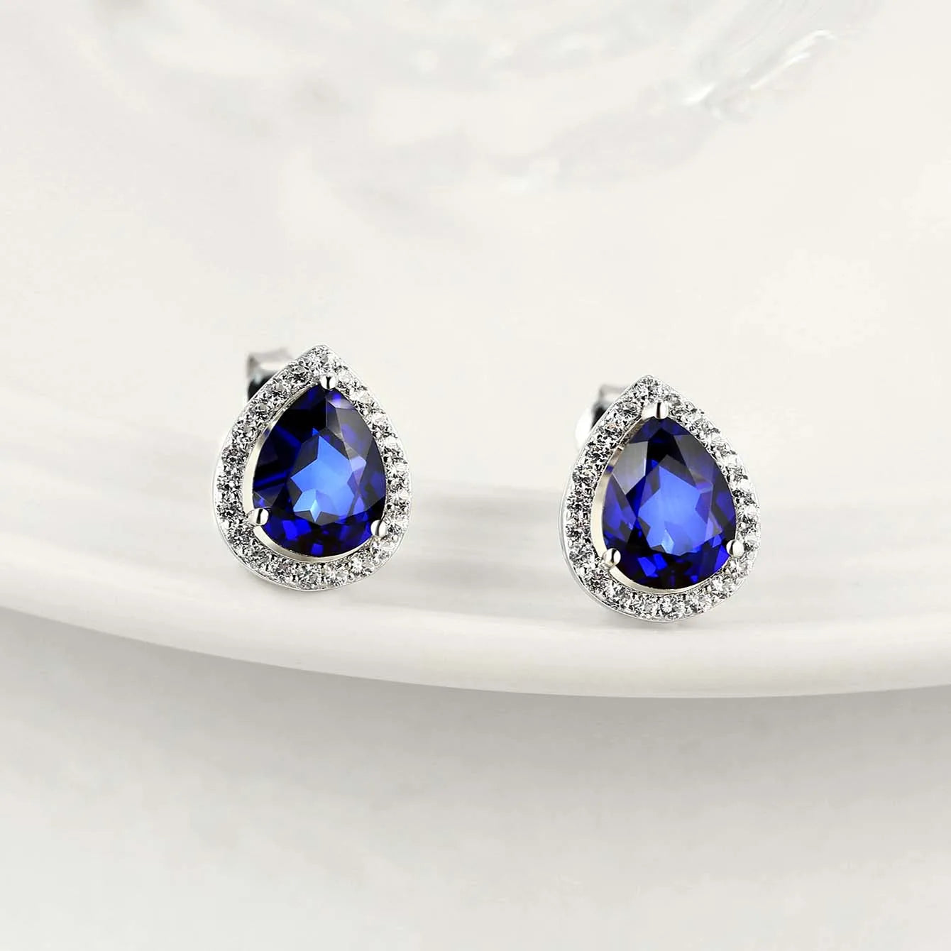 Pear-Cut Sapphire Stud Earrings in Sterling Silver with White Rhodium Plating