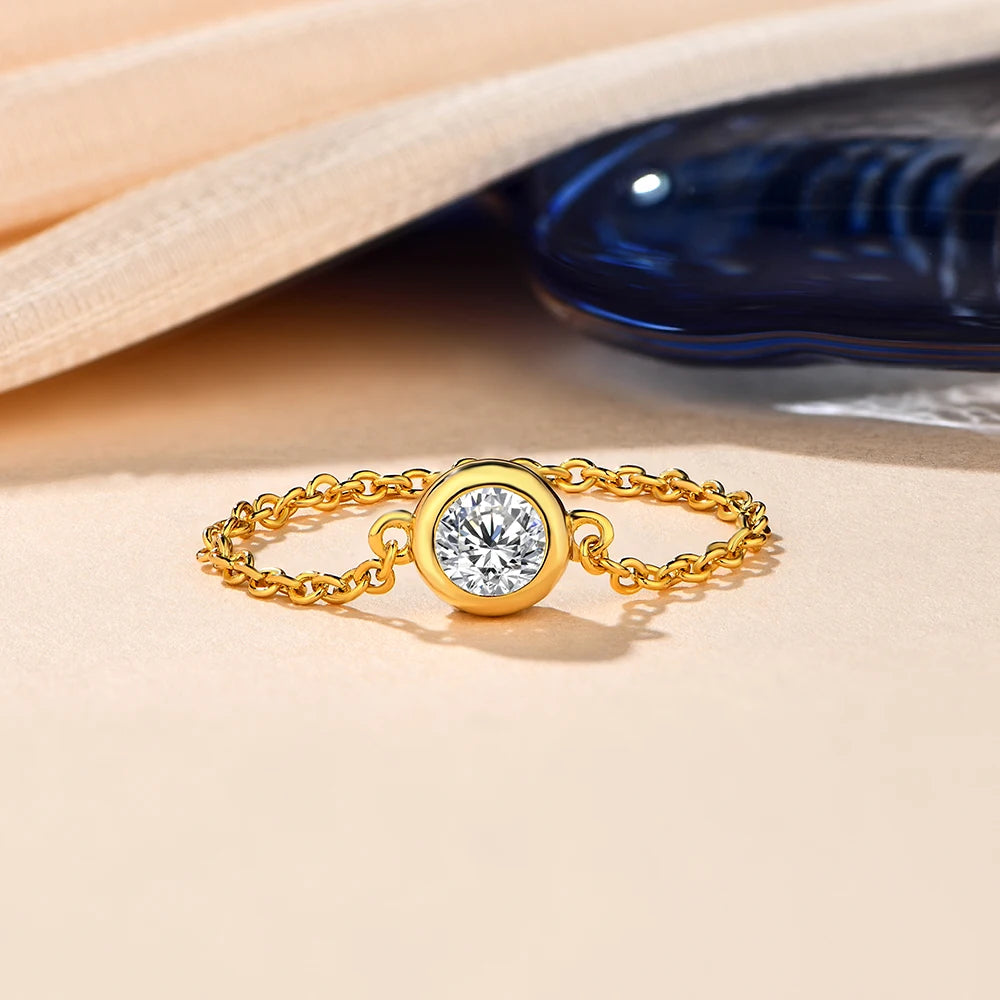 Round-Cut Moissanite Bezel-Set Ring in Sterling Silver with Yellow Gold Plating