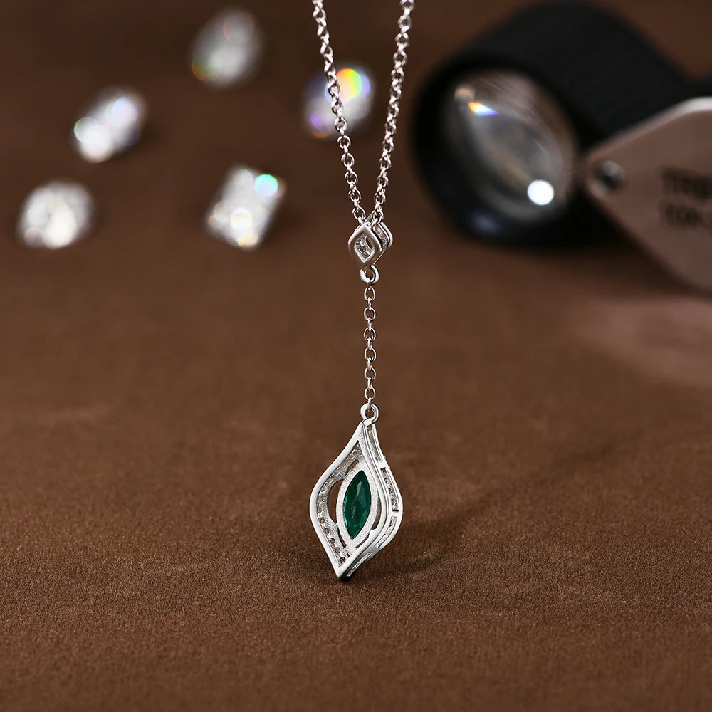 Marquise-Cut Emerald and Moissanite Pendant Necklace in Sterling Silver